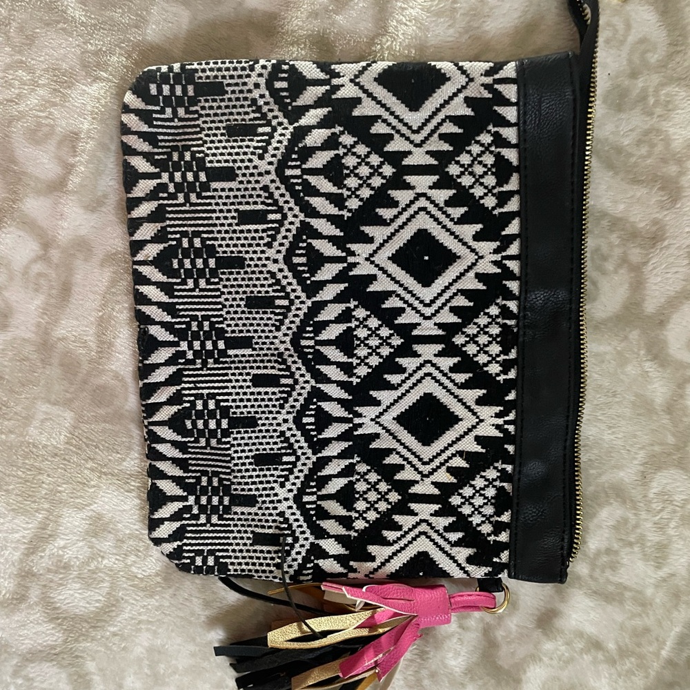 No Boundaries Black and Cream Patterned Clutch with Tassels